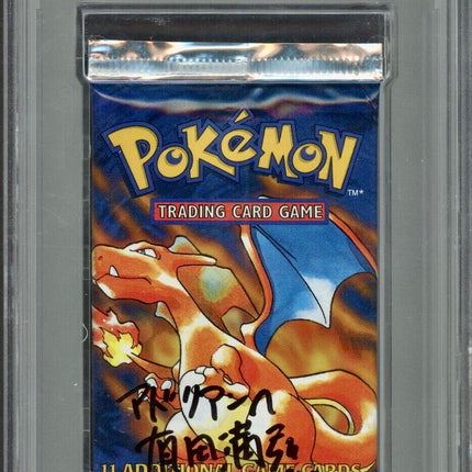 Mitsuhiro Arita Signed 1999 Pokémon WOTC Sealed Base Set Foil Pack - Charizard Art - PSA/DNA 10 AUTO